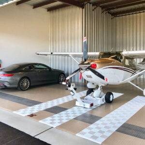plane-and-mercedes-in-hangar.jpg
